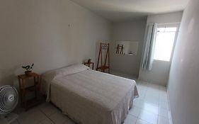 Quarto com banheiro privativo perto da praia